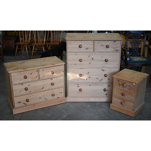 90 - A seven piece pine bedroom suite, comprising a desk; a mirror; stool; a chest of three short over th... 