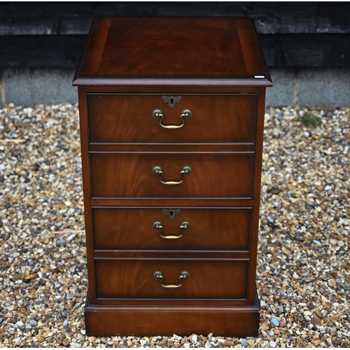 99 - A reproduction mahogany Georgian style filing cabinet, the two drawers as twin short dummy drawer fr... 