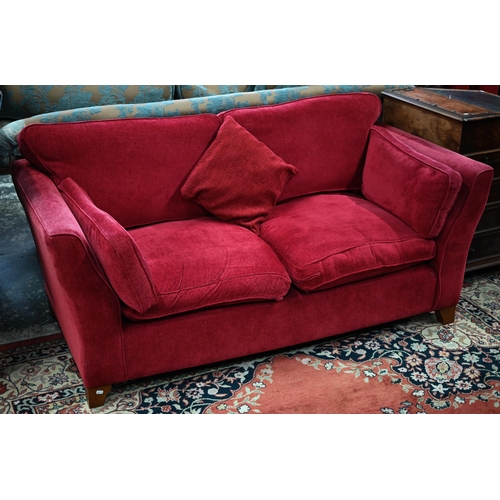 A pair of modern red fabric 'Aldeburgh' two-seater sofas, 180 cm w x 95 cm d x 85 cm h