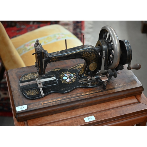 524 - #An antique C & K Improved Singer System sewing machine