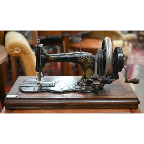 524 - #An antique C & K Improved Singer System sewing machine