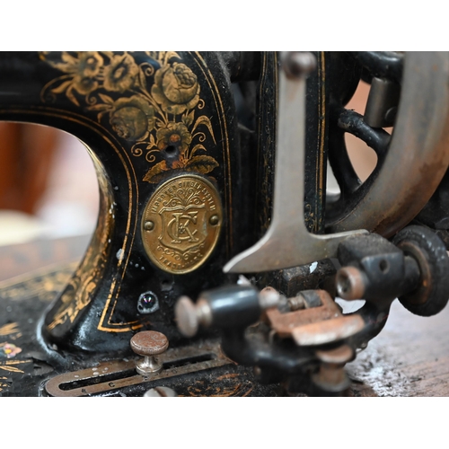 524 - #An antique C & K Improved Singer System sewing machine