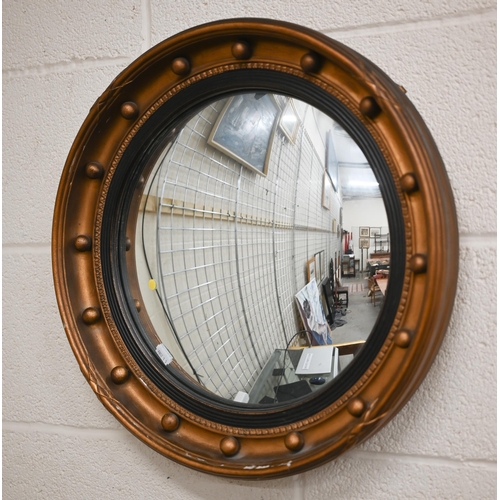 131A - A Regency style gilt framed convex mirror, 48 cm diameter