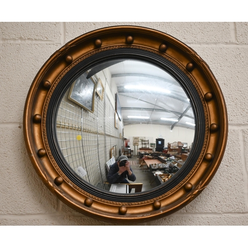 131A - A Regency style gilt framed convex mirror, 48 cm diameter