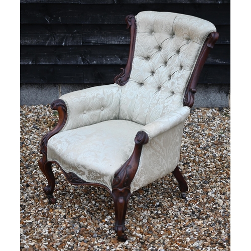 515 - A Victorian mahogany armchair with pale green button back damask upholstery