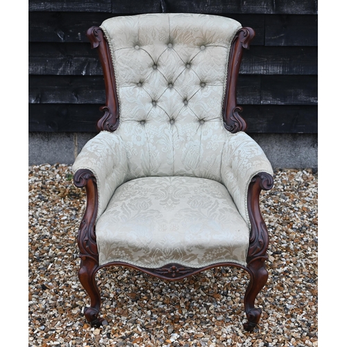 515 - A Victorian mahogany armchair with pale green button back damask upholstery