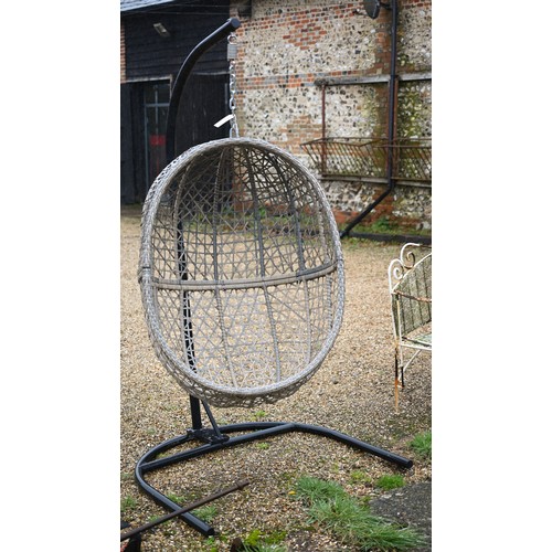 70 - A 'Majestique' woven synthetic rattan hanging garden 'egg' chair on suspension chain from black tubu... 