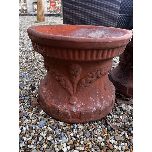 115 - A pair of weathered terracotta planter pots/plinths (2)