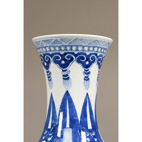 334 - A late 19th century Chinese blue and white vase, the flared neck painted with diaper, ruyi-head and ... 