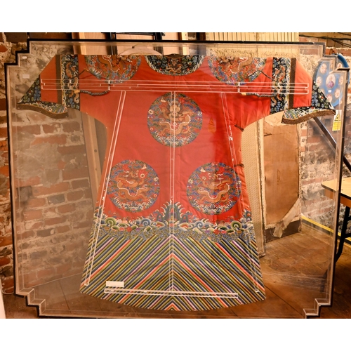 360 - A 19th century Chinese semi-formal red satin dragon robe, Qing dynasty, finely embroidered in colour... 