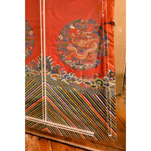 360 - A 19th century Chinese semi-formal red satin dragon robe, Qing dynasty, finely embroidered in colour... 