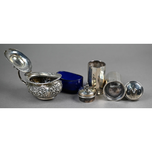 102 - A silver four-piece condiment set, William Neale, Birmingham 1937, to/w an Edwardian mustard and an ... 