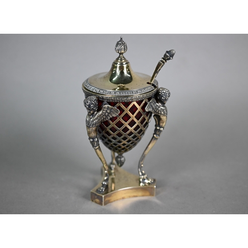 110A - A late Victorian Adam Revival silver gilt sucrier and cover with ruby glass liner, with foliate fini... 