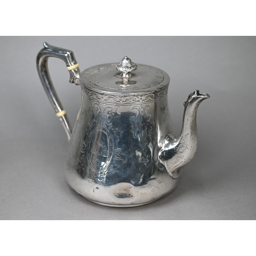 116 - A Victorian heavy quality silver teapot of squat baluster form with engraved decoration, ivory insul... 