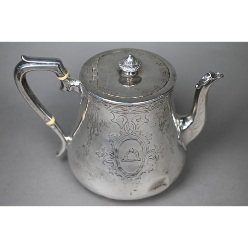 116 - A Victorian heavy quality silver teapot of squat baluster form with engraved decoration, ivory insul... 