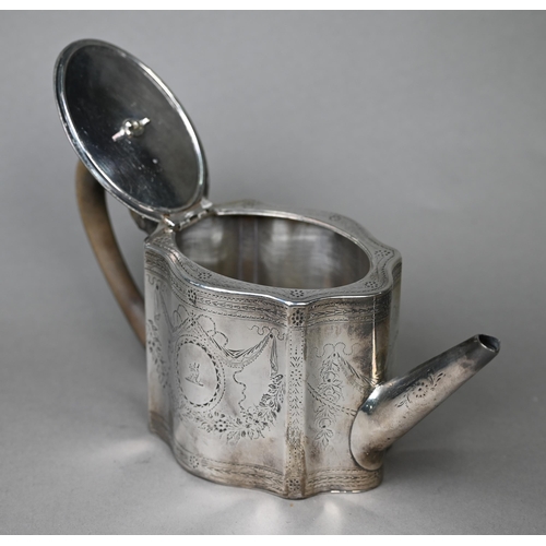 117 - A George III silver teapot of serpentine form with engraved decoration and wooden handle and finial,... 