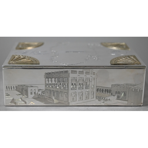 120 - A modern silver State of Qatar presentation cigarette box, engraved with map of Qatar, depictions of... 