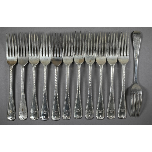 121 - A matched set of mostly Victorian silver bright-cut flatware, comprising twelve each table and desse... 