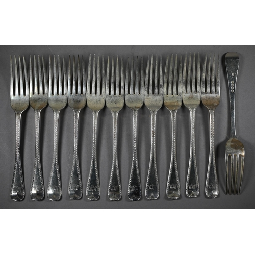 121 - A matched set of mostly Victorian silver bright-cut flatware, comprising twelve each table and desse... 