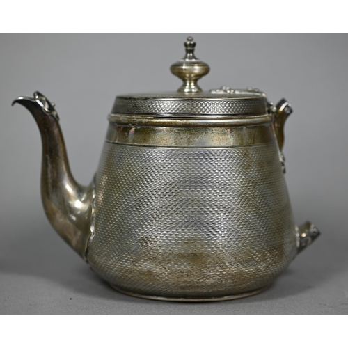 124 - A Victorian silver bachelor teapot, decorated overall with engine turning, with rivetted strap hinge... 