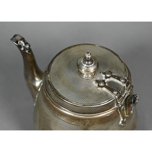 124 - A Victorian silver bachelor teapot, decorated overall with engine turning, with rivetted strap hinge... 