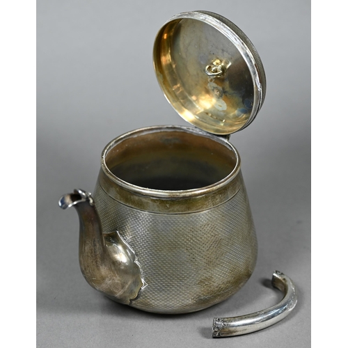 124 - A Victorian silver bachelor teapot, decorated overall with engine turning, with rivetted strap hinge... 