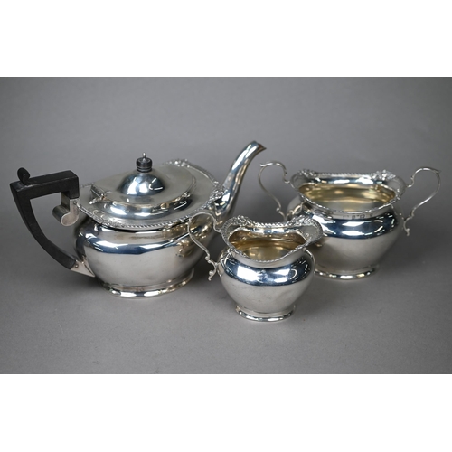 125 - A late Victorian silver three-piece bachelor tea service  with gadrooned and floral-chased rims and ... 