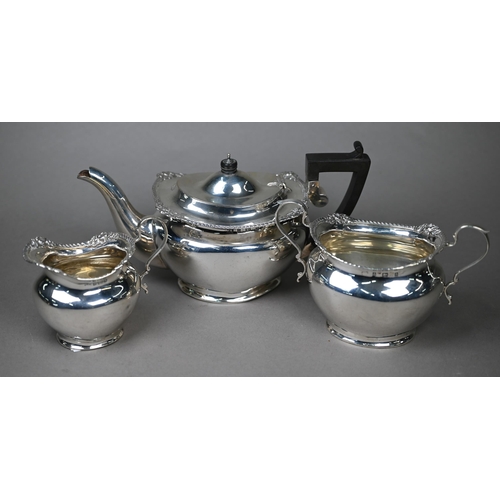 125 - A late Victorian silver three-piece bachelor tea service  with gadrooned and floral-chased rims and ... 