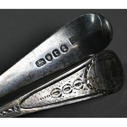 129 - A matched pair of George III Irish silver bright-cut tablespoons, James Keating (probably), Dublin 1... 