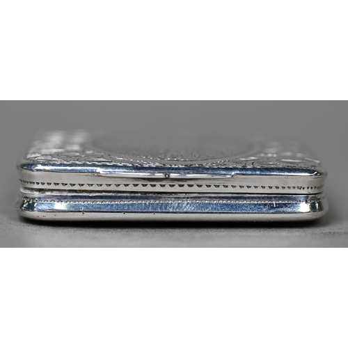 130 - A George III silver large vinaigrette, the engraved cover worked with a 'sweetheart' trophy, the gil... 