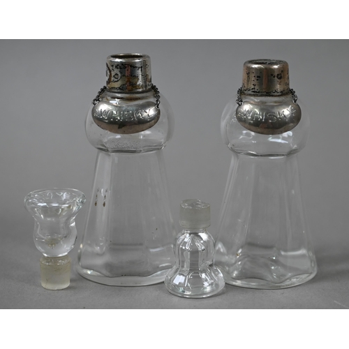 22 - A pair of thistle-shaped glass whisky noggins with silver collars, Schindler & Co, London 1910, ... 