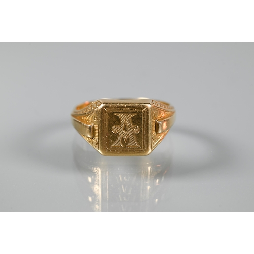 224 - An 18ct yellow gold signet ring with carved shoulders and monogrammed 'A' to face, size Y, approx 14... 