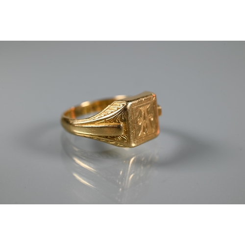 224 - An 18ct yellow gold signet ring with carved shoulders and monogrammed 'A' to face, size Y, approx 14... 