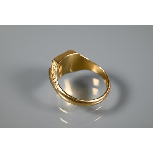 224 - An 18ct yellow gold signet ring with carved shoulders and monogrammed 'A' to face, size Y, approx 14... 