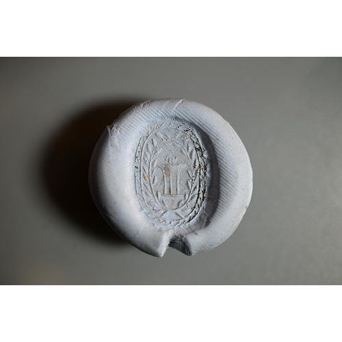 226 - An Etruscan cornelian carved scarab, the base with intaglio featuring fountain within laurel border,... 