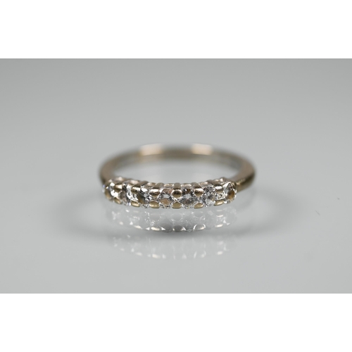 229 - A seven stone diamond ring, 18ct white gold set, size O, 0.50 carats, approx 3.7g all in