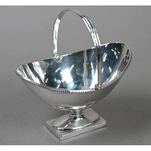 23 - A late Victorian silver Adam Revival bonbon basket of navette form with swing loop handle, with bead... 