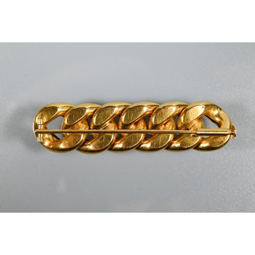 230 - A yellow metal cable link brooch formed of six flat curb links, stamped 750, 5.5 cm, approx 7.6g