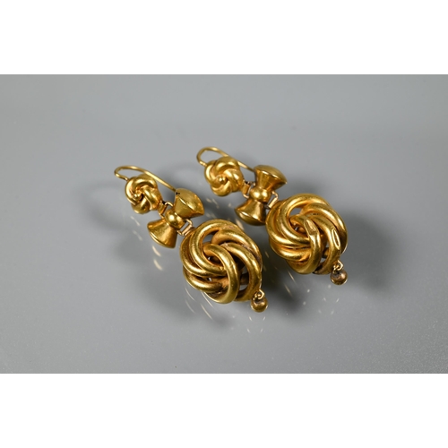 232 - A pair of knot and bow drop earrings for pierced ears, yellow metal (unmarked and untested), 4cm lon... 