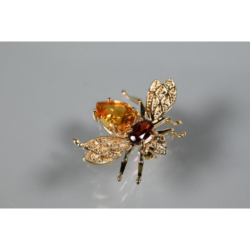 244 - A 9ct yellow gold bug brooch with outswept wings and stone set body, 3cm, approx 3.4g all in to/w a ... 