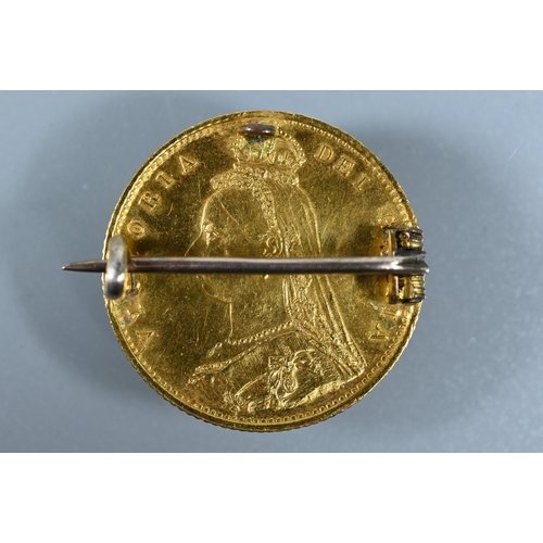 249 - A Queen Victoria gold half sovereign, dated 1887, fitted as a brooch