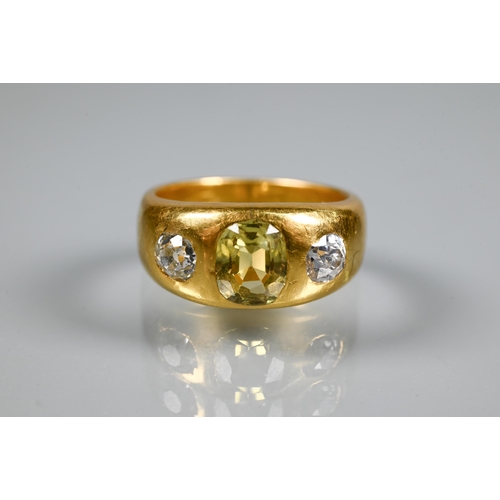 251 - A 22ct yellow gold gypsy ring set with two diamonds and central yellow stone, possibly sapphire, dia...