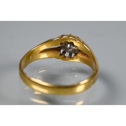 252 - A Victorian single stone diamond ring in yellow gold, the old European cut stone claw set in a gentl... 