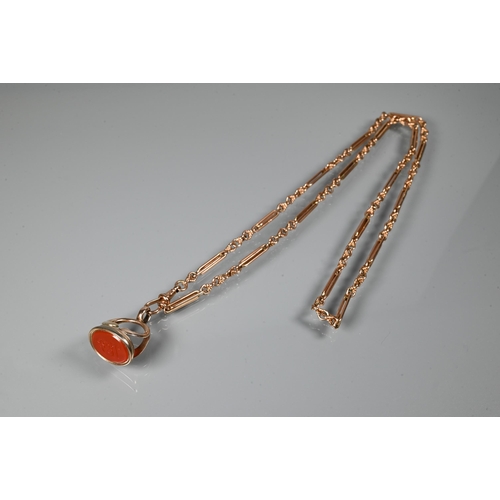 257 - A rose-gold fetter link Albert chain with swivel and cornelian set fob attached, 37 cm long (closed)... 