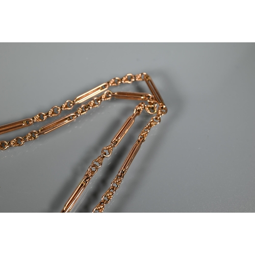 257 - A rose-gold fetter link Albert chain with swivel and cornelian set fob attached, 37 cm long (closed)... 