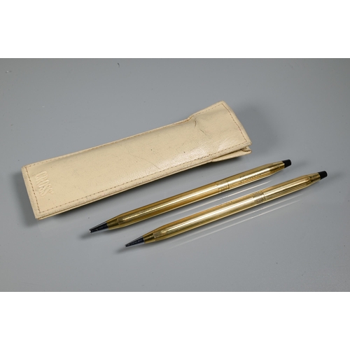 260 - A Cross ballpoint pen and propelling pencil set '1/20 10k gold-filled', in original cream pouch