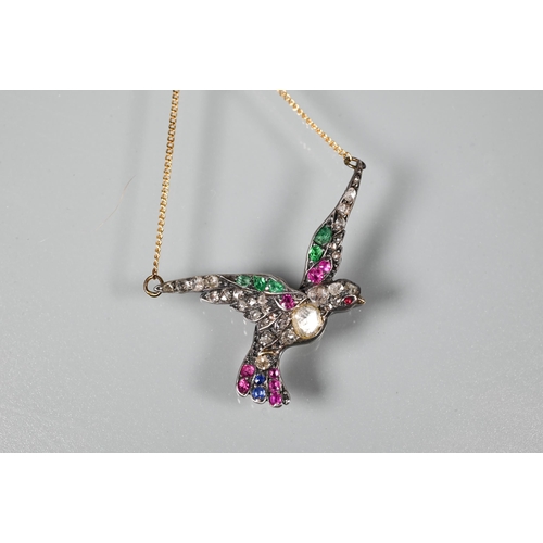 270 - A multigem-set pendant in the form of a dove with outstretched wings adorned with mixed cut diamonds... 