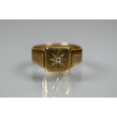 274 - A 9ct yellow gold signet ring with starburst set diamond, size S, approx 4.4g