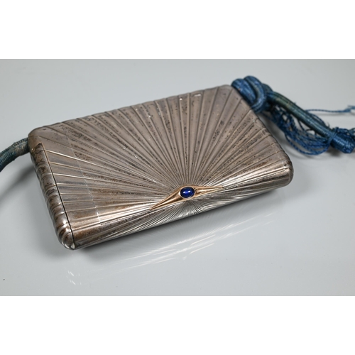 279 - A Russian silver cigarette and vesta case of hinged rectangular form with radial sunburst design, wi... 