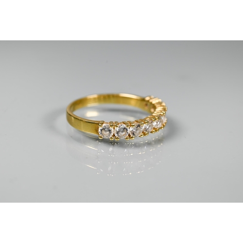 288 - A 9ct yellow gold signet ring, size U, approx 3.6g to/w a white sapphire half eternity ring set unma... 